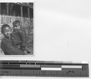 A boy and his brother in Andong, China, 1935