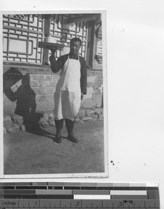 A pie maker at Chiaotou, China, 1935