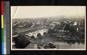 Bridge over river in city, Jiangsu, China, ca.1900-1932