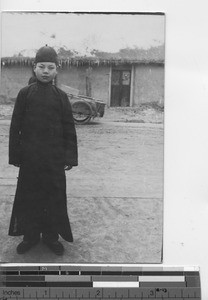 A boy dressed for the New Year in Fushun, China, 1946