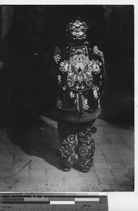 Ornate childrens clothing at Fushun, China, 1939