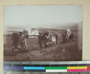 Traveling with carriers and luggage, Madagascar, 1901