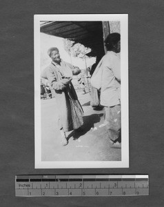 Receiving grain during famine relief effort, Tingzhou, China, 1921