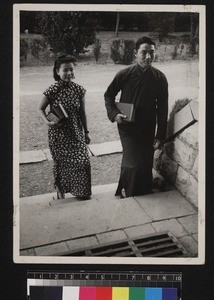 Two Christians entering church, China, ca.1947