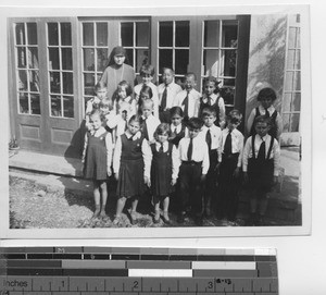 Maryknoll Sister with first grade at the Dalian Academy, Dalian, China