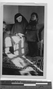 Maryknoll Sister with children at Andong, China, 1925