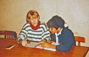 Homework assistance for school girls in Cairo. One of DMS's volunteers helps an Egyptian girl a