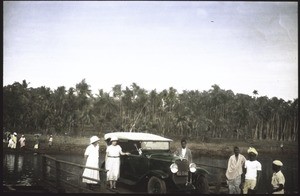 Crossing the Ponami River with Mr & Mrs Dengler