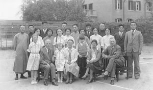 Dr. Robertson and the family Ellerbek with the last group of young doctors from Mukden, who had