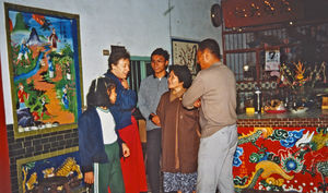 DMS Missionary Birgit Norholdt with C' hen Li-ping (left), visiting a local family in Taiwan. (