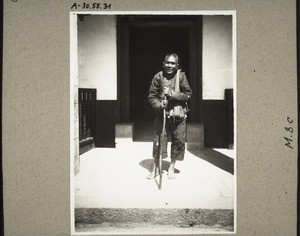 A blind beggar at the door of our house