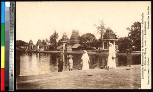 People walking by a sacred pond, Kumbakonam, India, ca.1920-1940