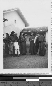 Maryknoll Sisters and young children, Tungshek, Kaying, China, ca. 1940