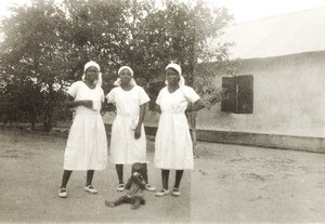 Nigerian nurses and child, Nigeria, ca. 1929