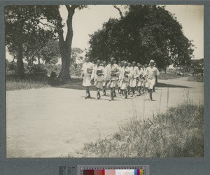 School children marching, Mwenzo, Zambia, ca.1920