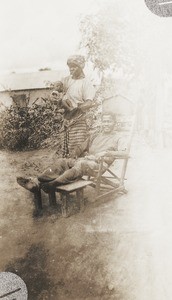 Lock-jaw sufferer with family, Nigeria, ca. 1925