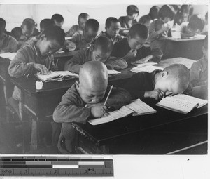 Students working at mission school at Chiatou, China, 1940