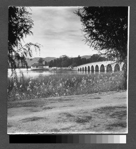 Masonry bridge over water, Sichuan, China, ca.1900-1920