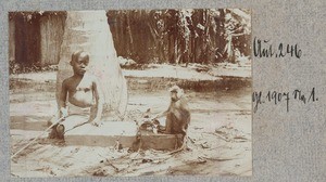 African boy with rhesus monkey, ca.1900-1902