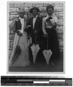 Girls and a man wearing European clothing, South Africa East