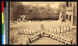 Youths performing gymnastics outdoors, Madagascar, ca.1920-1940