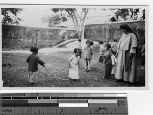 Children playing the orphanage at Luoding, China, 1939