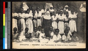 Missionary fathers with gathered assistants, Ethiopia, ca.1920-1940