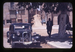 man beside an automobile