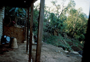 A typical day for women in rural Nepal is like this: Waiting for the water to boil, the woman i