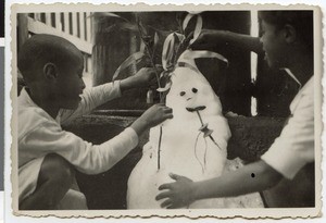 Ethiopian children with a snow man, Addis Abeba, Ethiopia