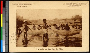 Young boys fishing in a river with nets, India, ca.1920-1940