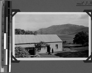 Mission house and mountain in Baziya, South Africa East, 1933-12-15