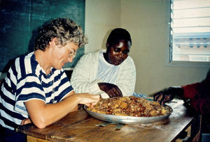 DMS Missionary Ida Kongsbak at Lukajange, Tanzania. Here enjoying a traditional meal together w