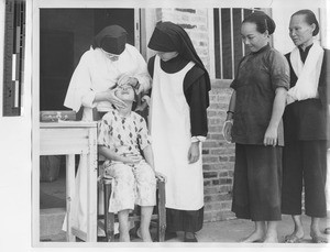 Maryknoll Sisters at dispensary at Jiangmen, China, 1947