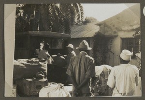 Loading a truck, Machame, Tanzania, ca.1930-1940