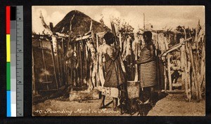 Two women pounding a mortar, Angola, ca.1920/1940