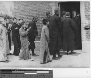 A processsion to the church at Fushun, China, 1938