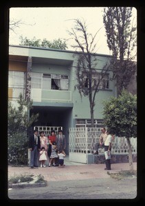 Family outside their home