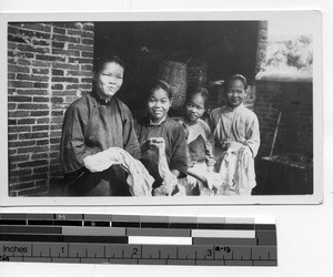 Orphans washing clothes at Luoding, China, 1935