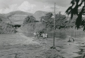 Car on a flooded road, ford of Ankaramena on the road to the South, in Madagascar