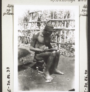 A christian from Babungo with leprosy reads his Bible