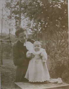 Zelie Galland with a child, in Madagascar