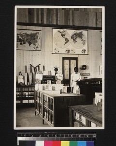 Man inside mission school book shop, West Africa, 1926