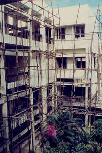 Tamil Nadu, South India. Scaffolding for construction of the new 3rd floor of the Women Student