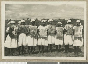 Nurses holding biblical illustrations, Chogoria, Kenya, March 1949