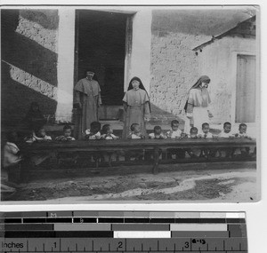 Meal time at the orphanage at Luoding, China, 1927