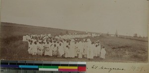 A crowd of people greeting deaconess Sina Loeken welcome back, Mangarano, Madagascar, 1923