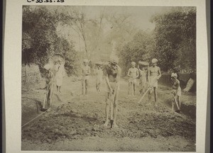 Building a road near the mission house in Udapi, with an overseer