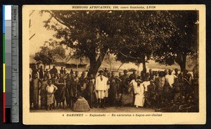 Missionary father poses with the men of a village, Zagnanado, Benin, ca. 1900-1930