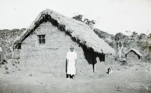 Nyasaland Man outside Mud and Thatch House, Malawi, ca. 1914-1918